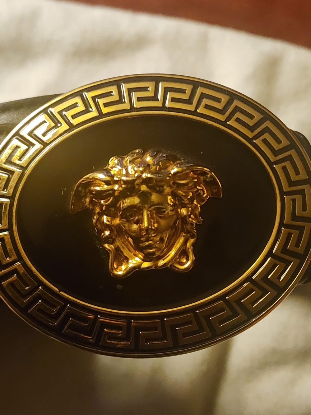 Versace Black and Gold Medusa Oval Buckle Belt
